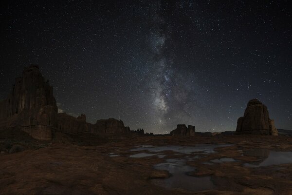 Beautiful landscape on the background of the Milky Way