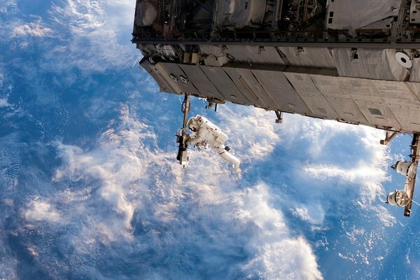 An astronaut in outer space at the space station