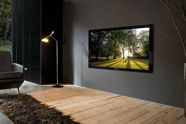 Interer i styl dobrana lampa podłogowa sofa