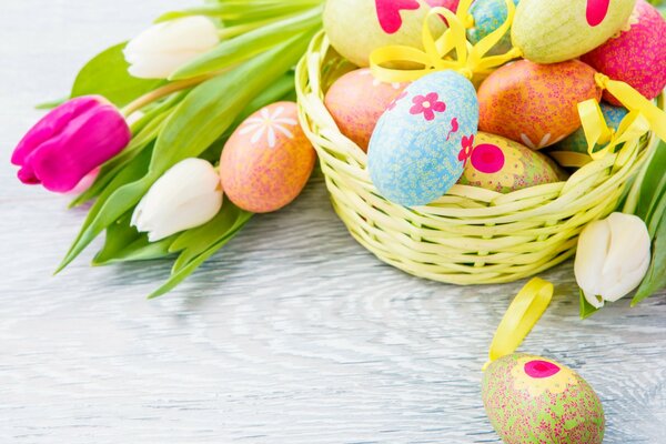 Colorful tulips and colorful eggs