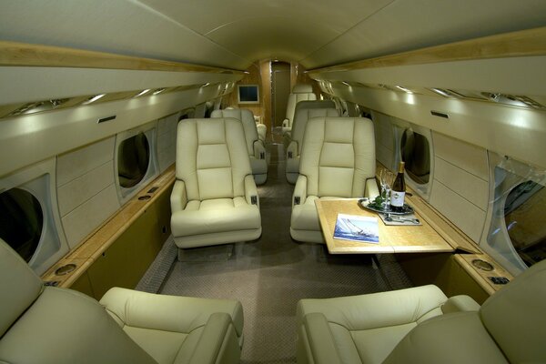 Prestigious airplane cabin with champagne buckets