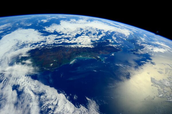 Earth from space ocean and clouds