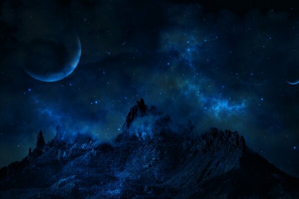 Night view of the planets under the mountain