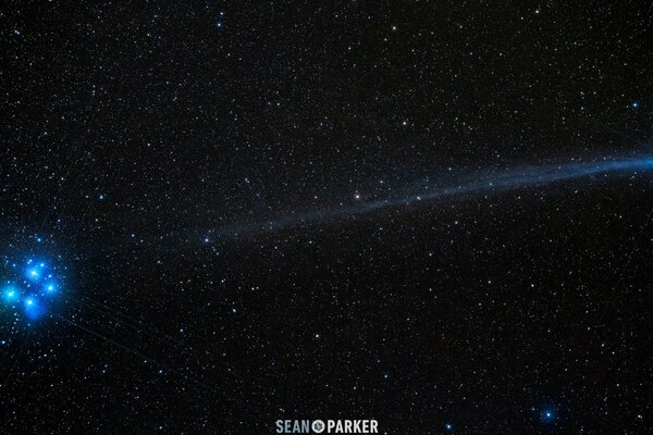 Night sky constellations and comet