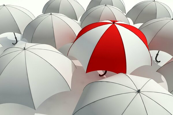Parapluie rayé rouge vif sur fond blanc