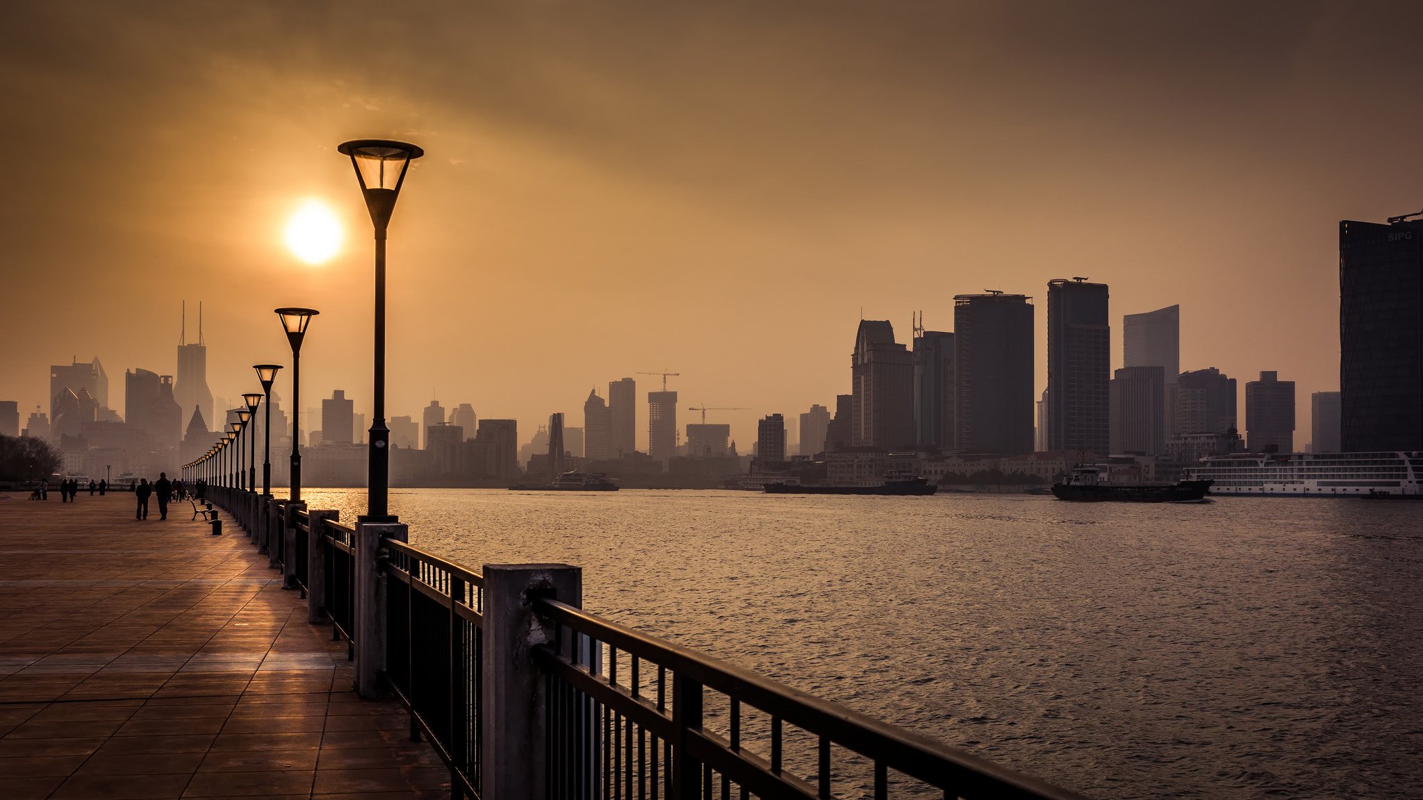 hanghai china asia embankment lamps skyscraper river sun