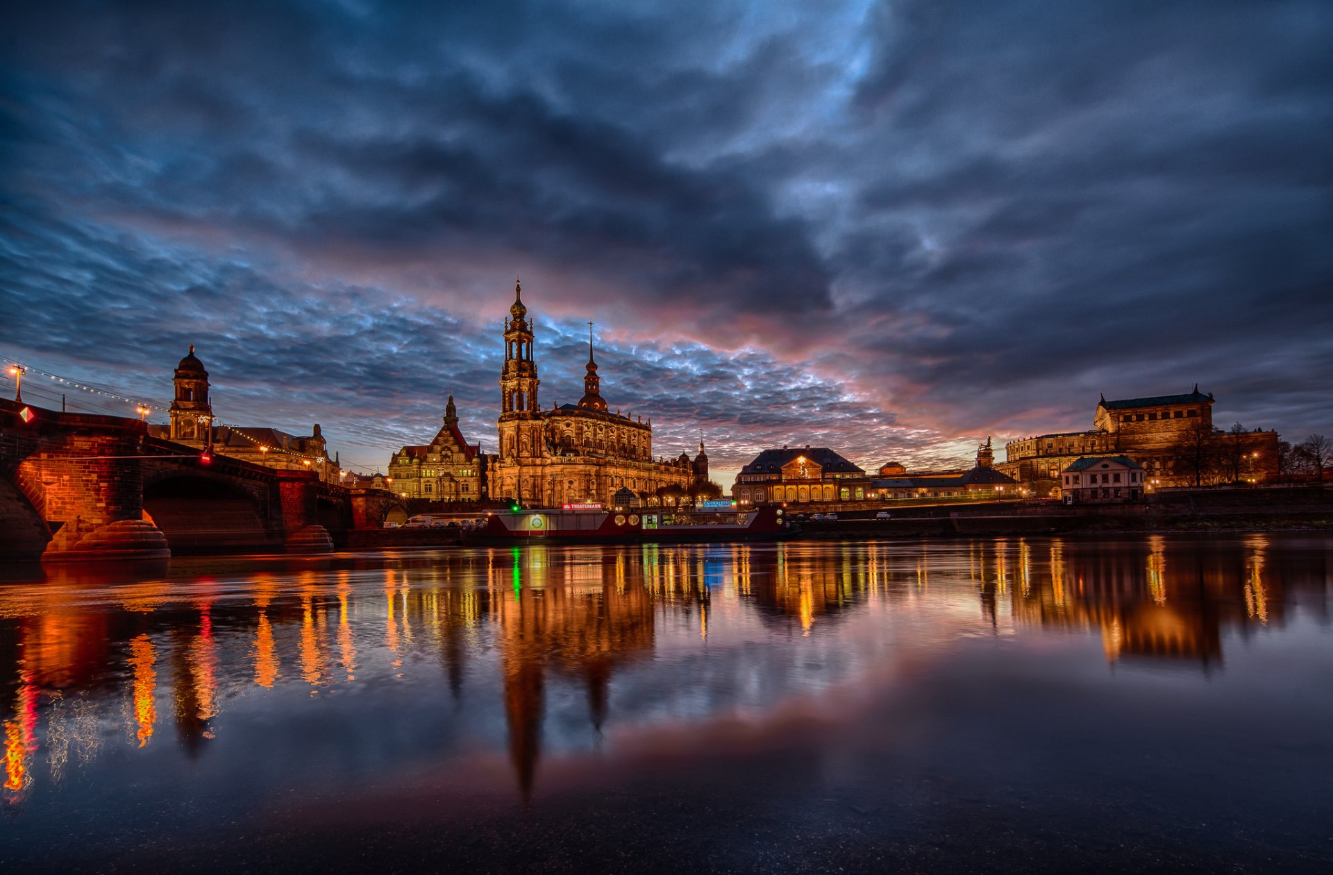 nature sky clouds water sunset town lights bridge