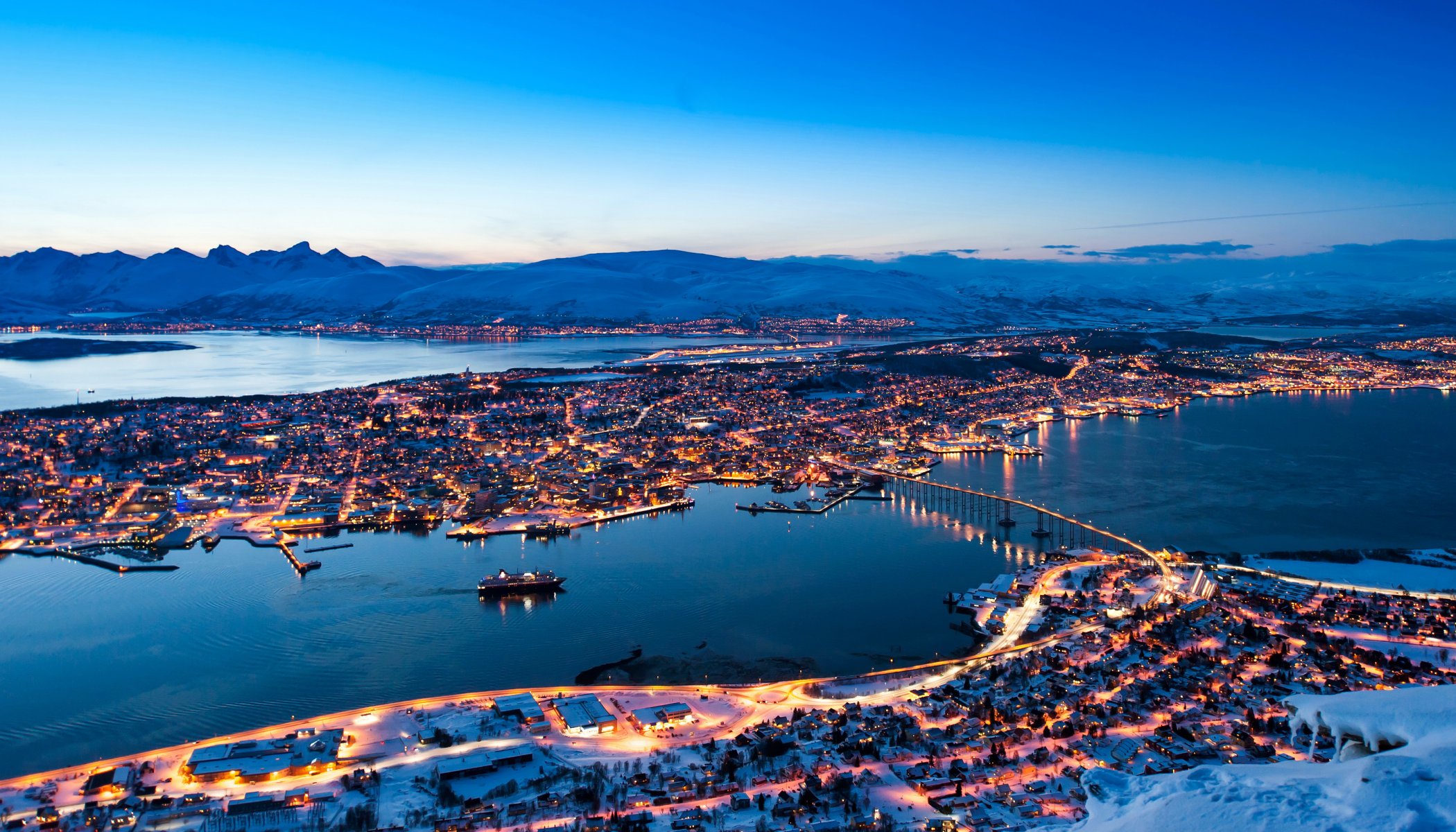 norway tromso night winter mountain snow house lights bridge street panorama landscape