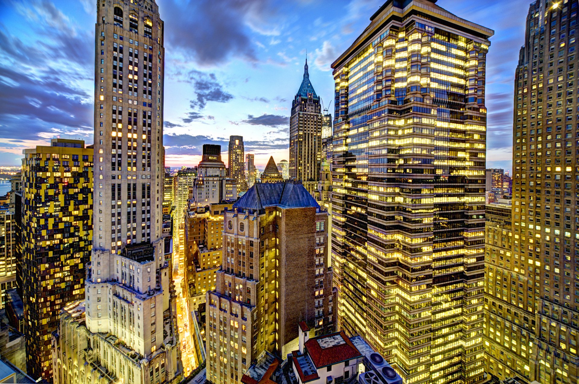 nueva york manhattan wall street estados unidos ciudad tarde puesta de sol rascacielos edificios casas ventanas luz luces