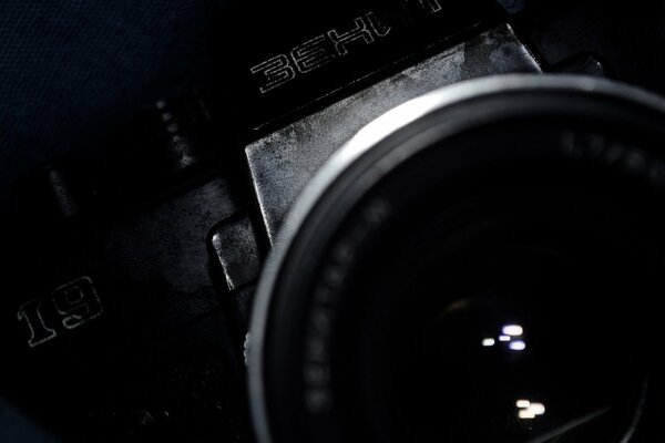 the lens of the black camera Zenit 