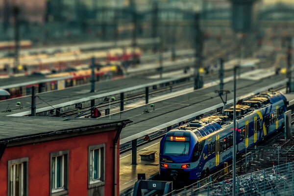 A train arriving at a railway station in Germany