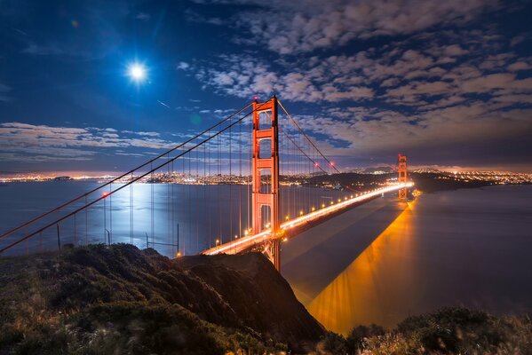 Golden Gate Bridge lights in the night sky
