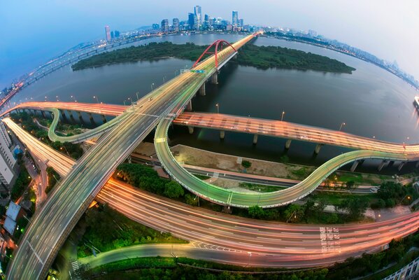 The bridge glows with different colors