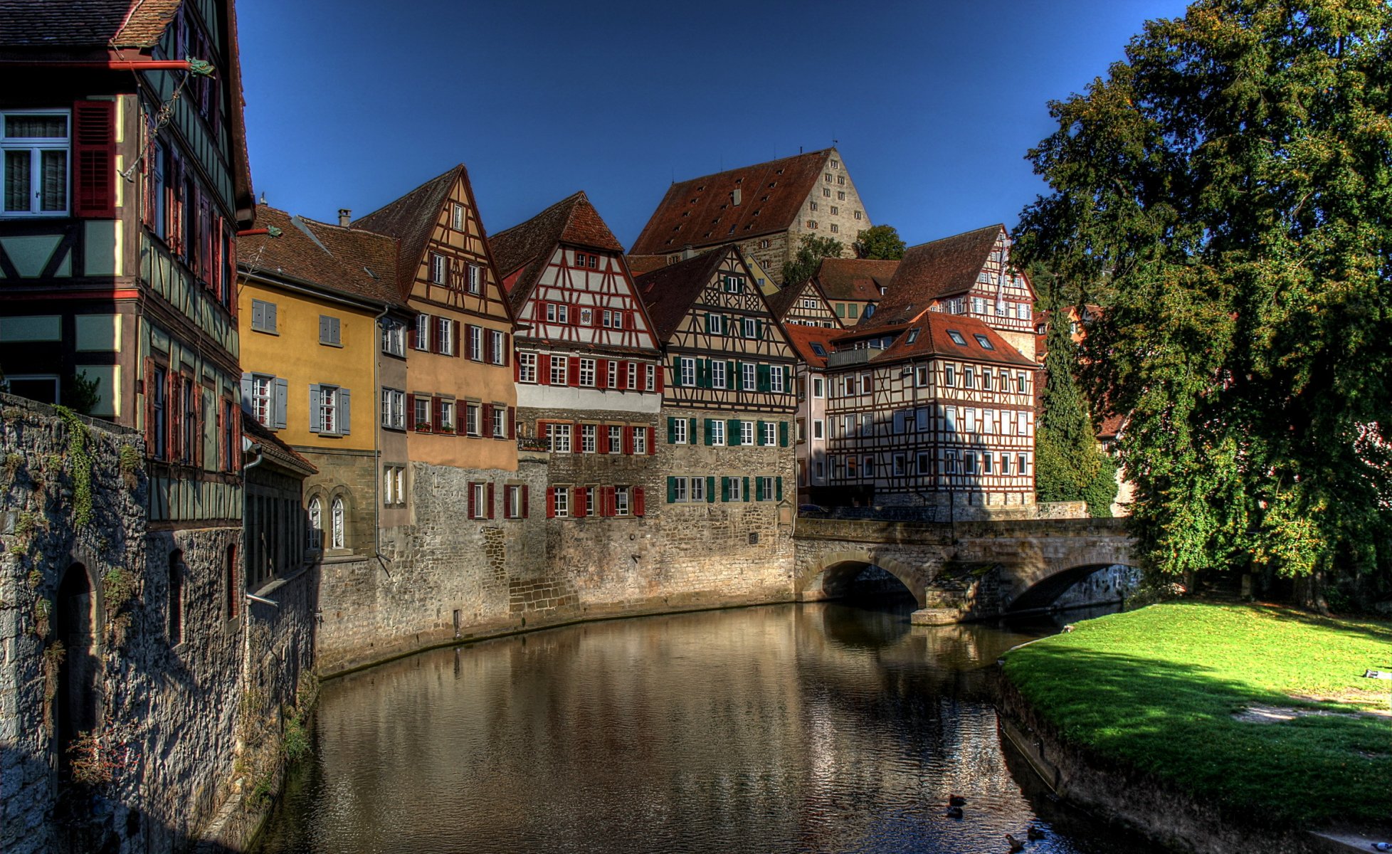 germany schwäbisch hall town buildings river grass tree sky