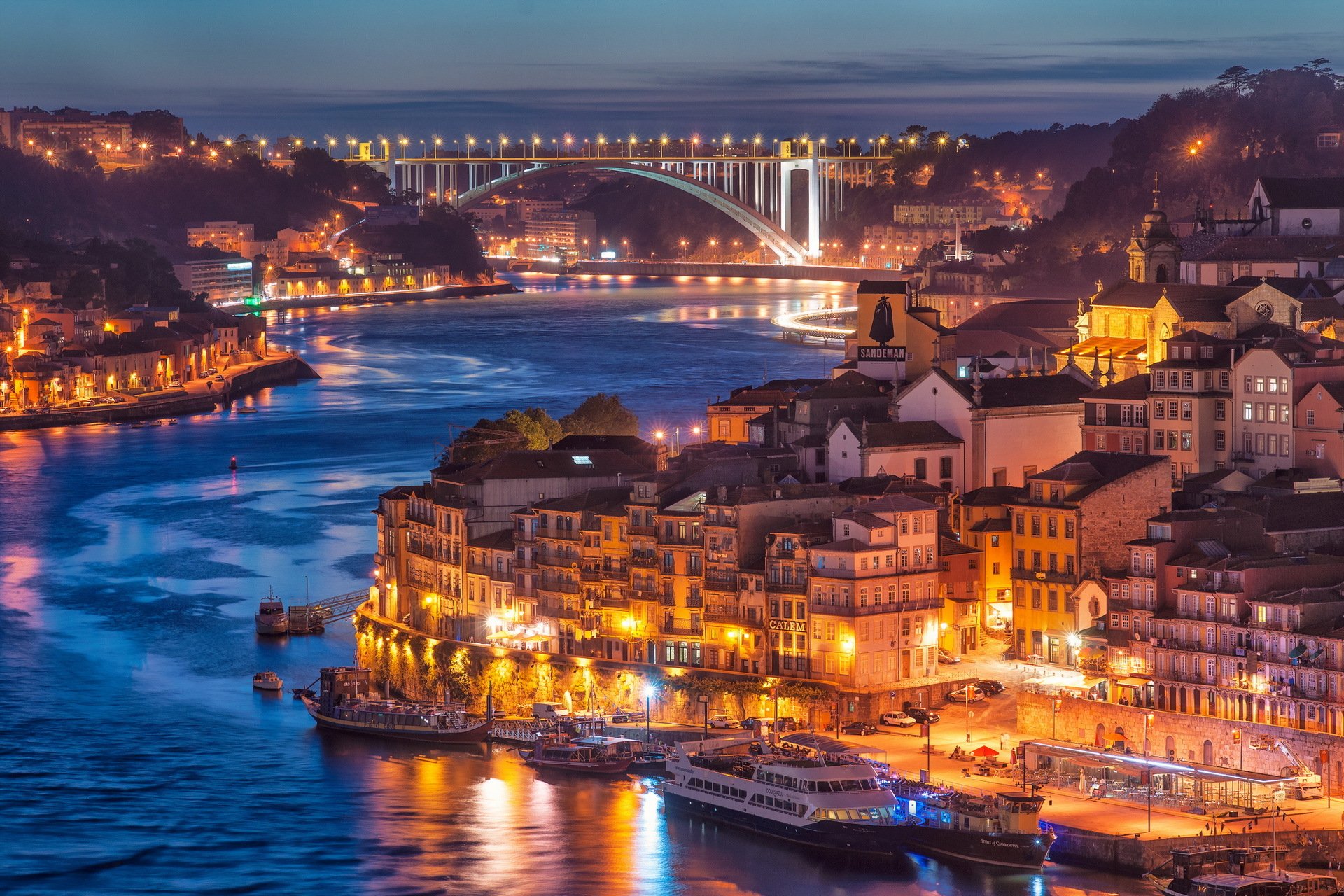 nightfall in porto city river bridge