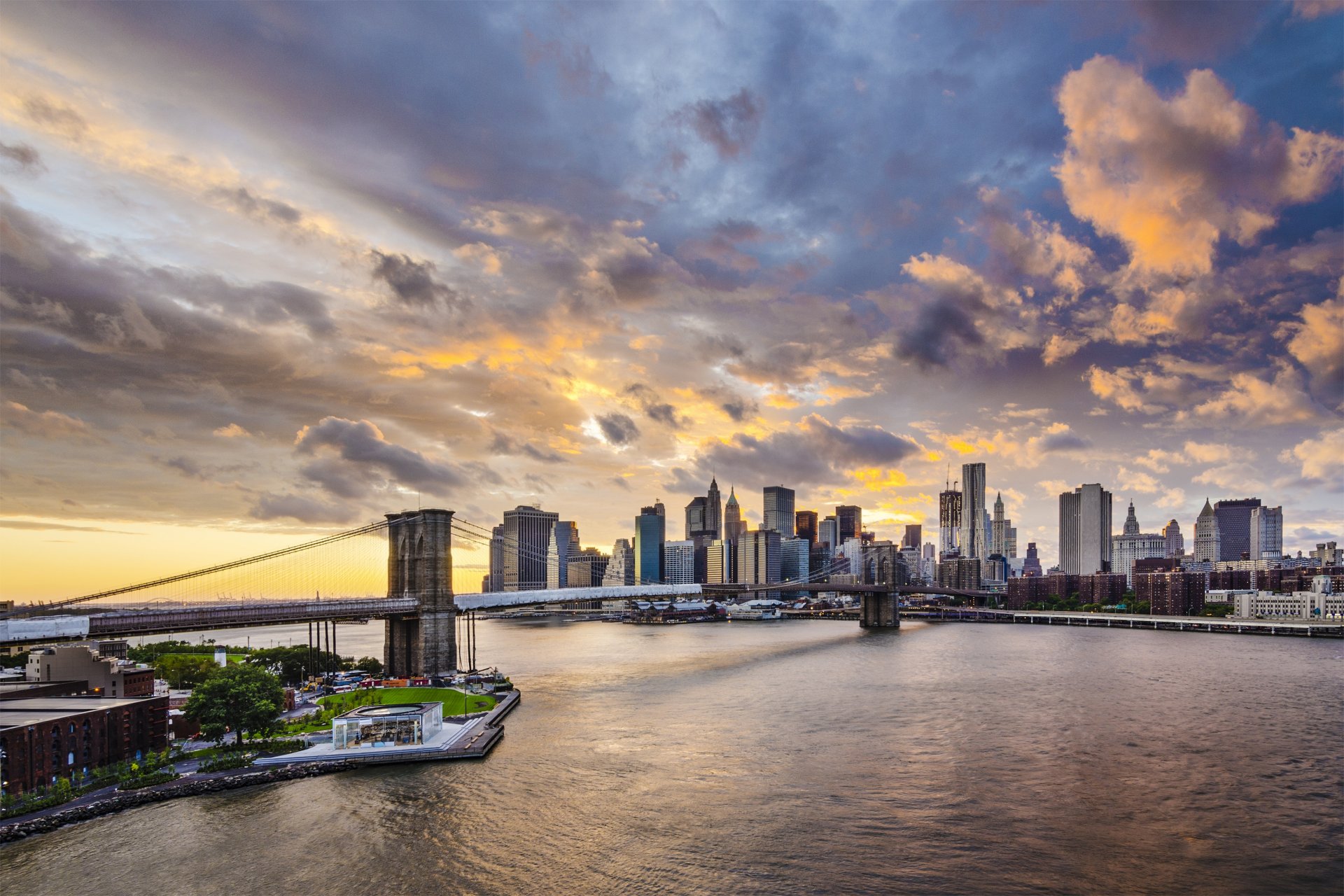 brooklyn bridge east river manhattan new york buildings embankment clouds bridge