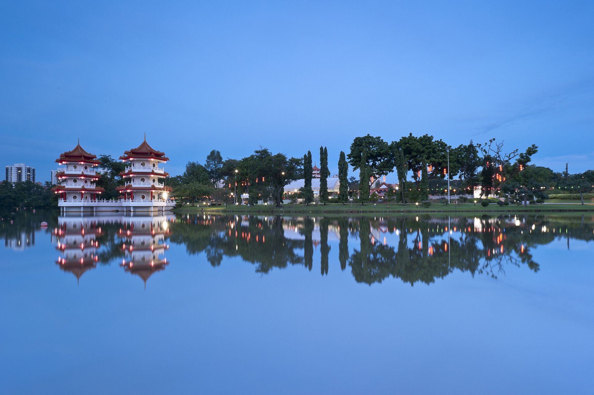 ingapore chinese garden city state architecture tree lake night blue sky reflection