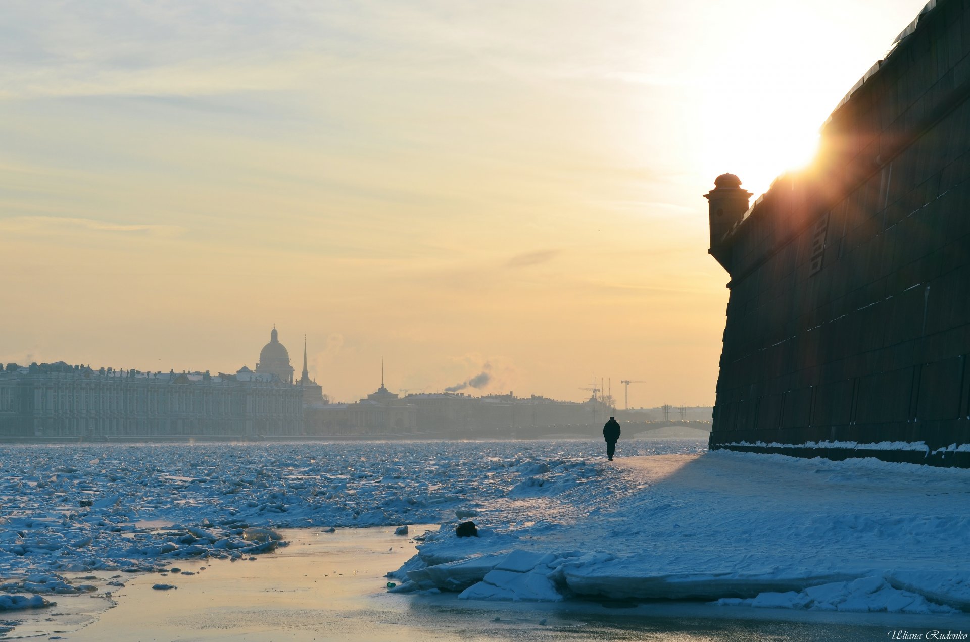 town st. petersburg peter winter loneliness man wall fortress and paul fortress sun sunset frost river neva snow