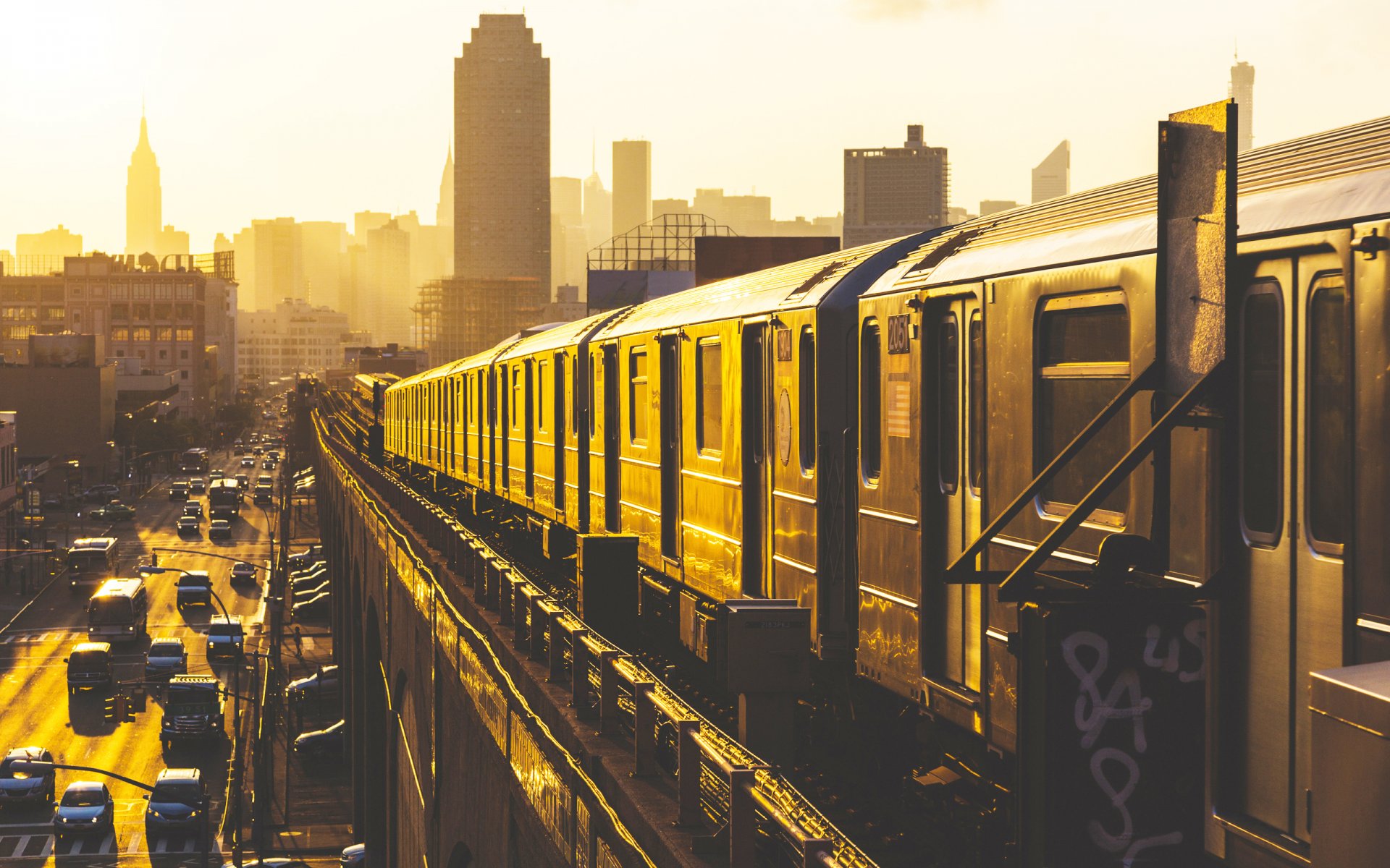 new york stati uniti stati città paesi metropolitana treno ferrovia mattina grattacieli vita ran sole auto strada strade auto rotaie carri bellissimi sfondi