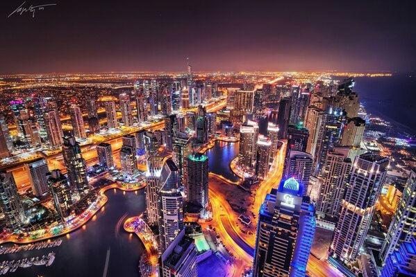 Dubai noche rascacielos en luces