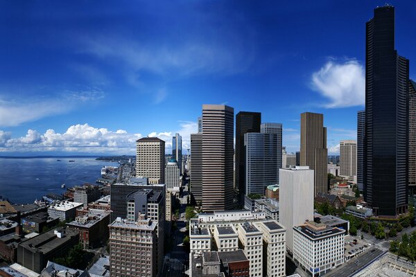 Seattle skyscrapers under the sky with clouds