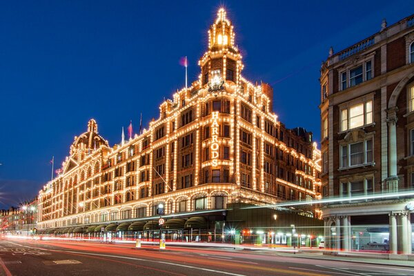 Photos of harrods department store in London in lights