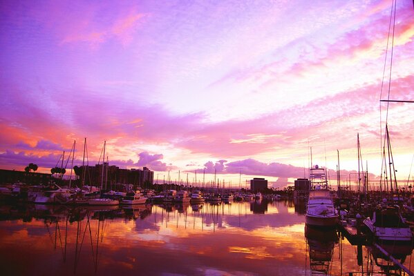 Seaport with orange sunset