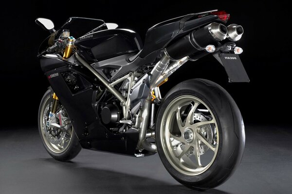 Black superbike Ducati 1198 on a black background