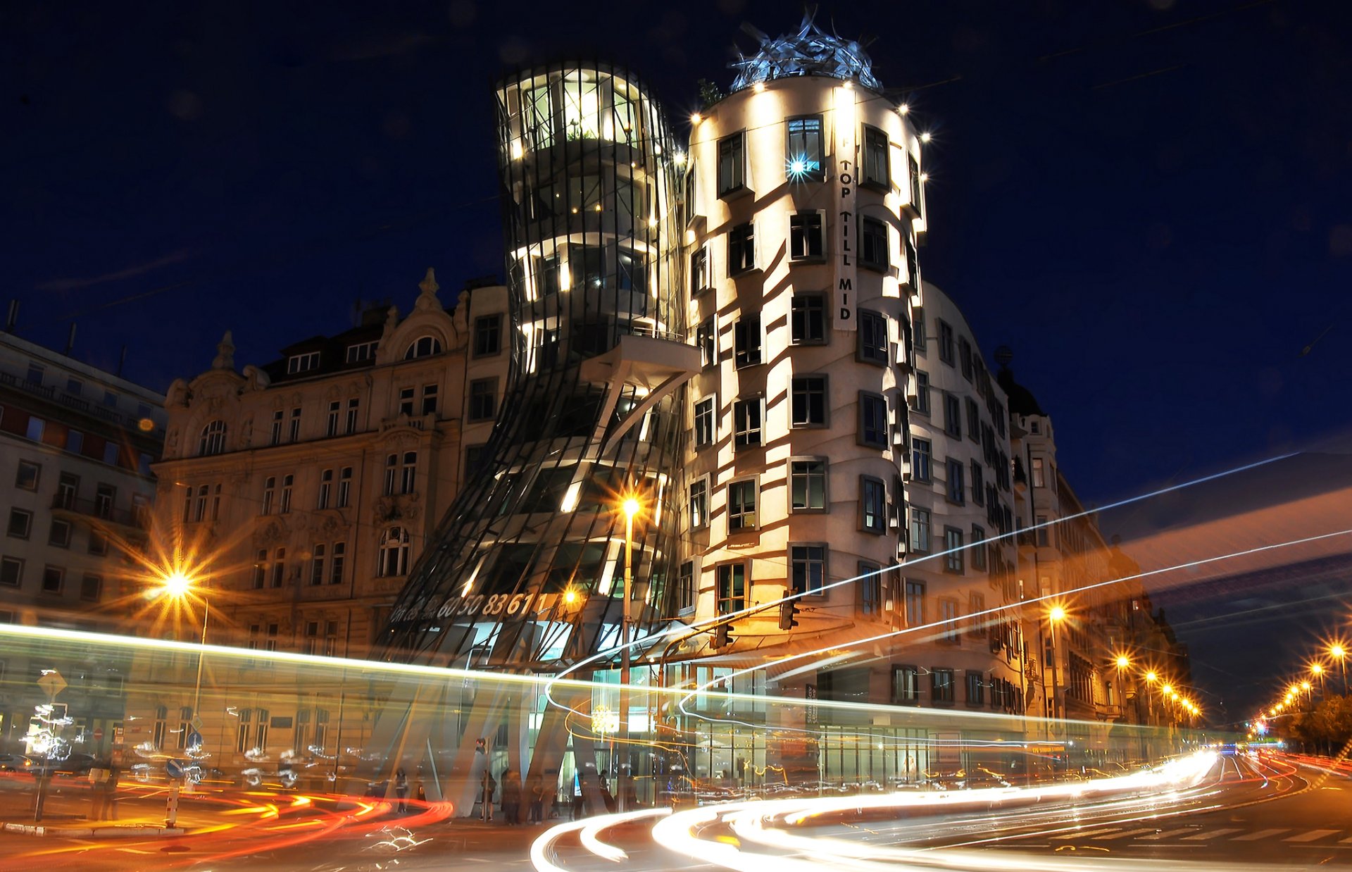 prague czech republic night lights dancing house embankment