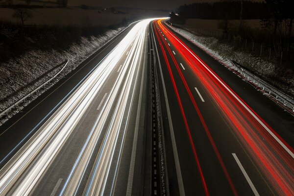 Night road in multicolored lights