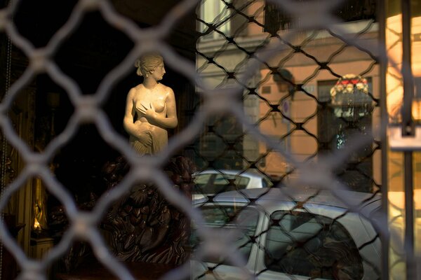 Antique sculpture on the street of Rome