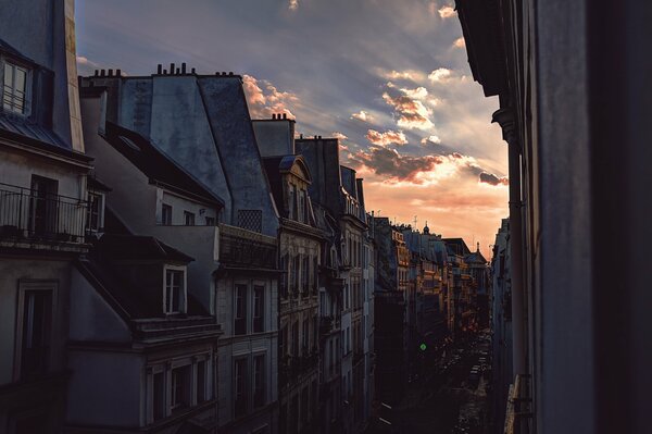 A street with old houses at sunset