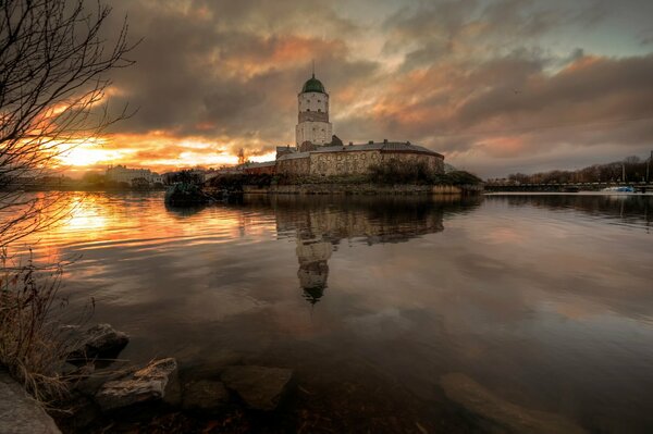 Autumn sunset in Vyborg, reflection in the water