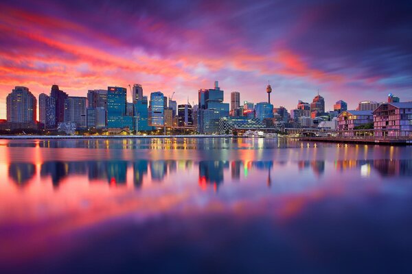 Pink dawn of the city of Sydney with a river
