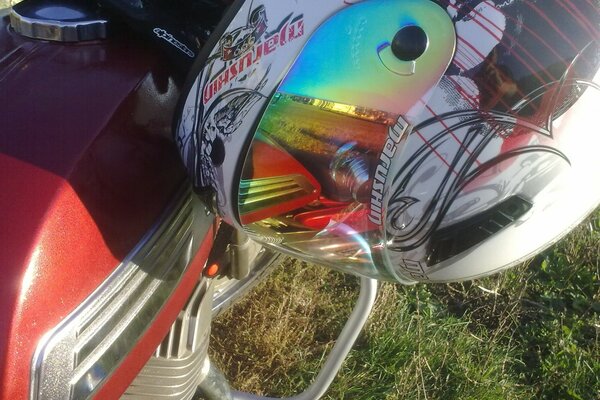 Motorcycle helmet with red motorcycle