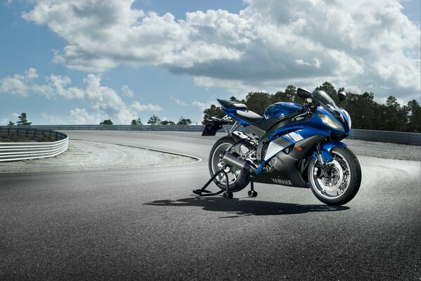 Blue sports motorcycle on the race track