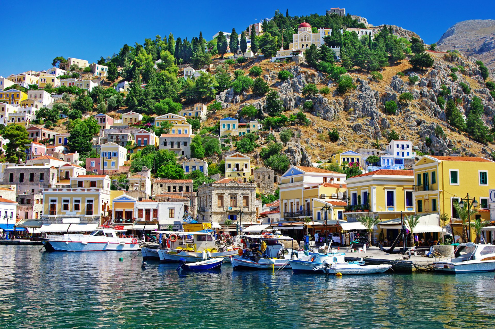 greece simi island aegean sea boat coast house mountain stones nature tree