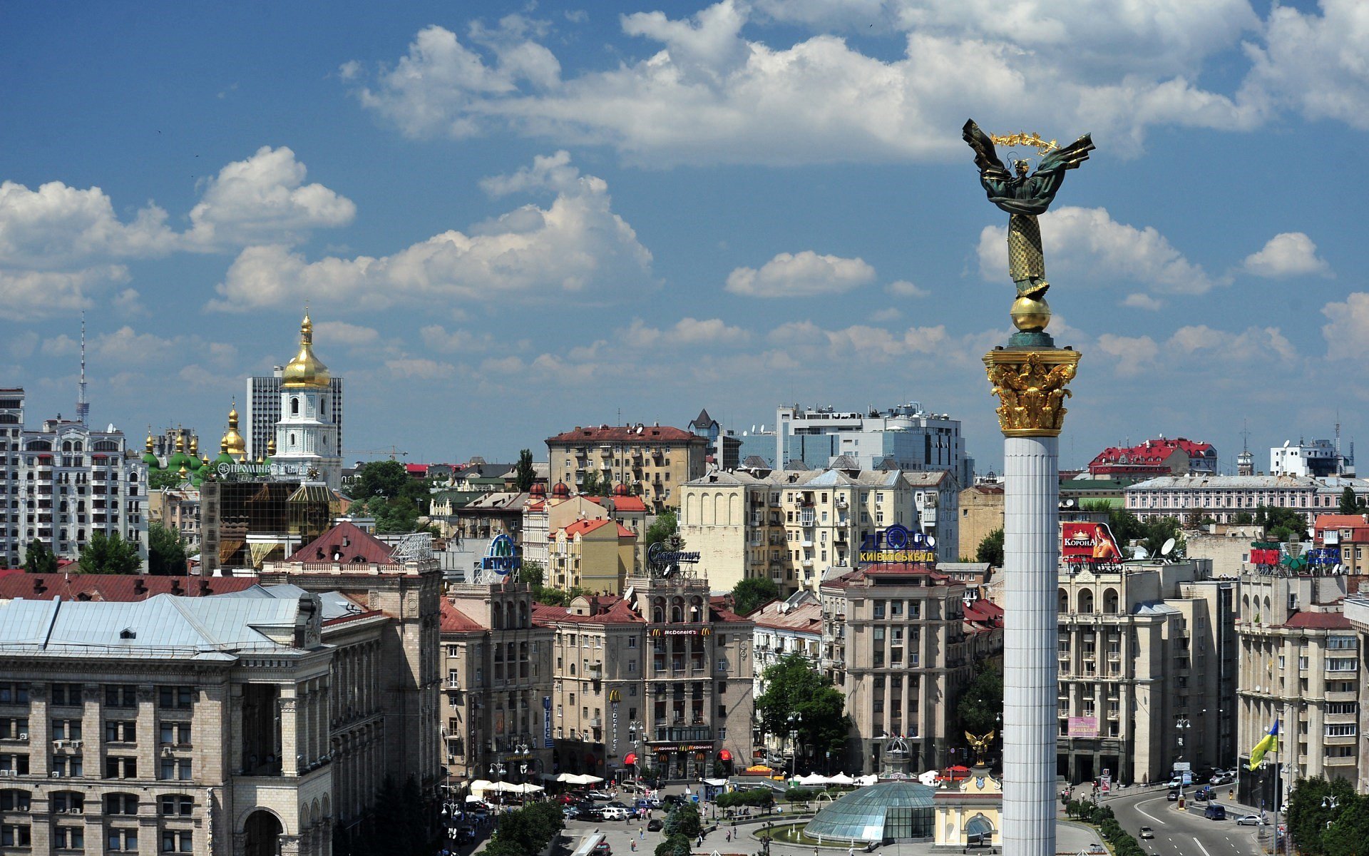 ukraine capital kiev maydan square buildings column statue sky cloud