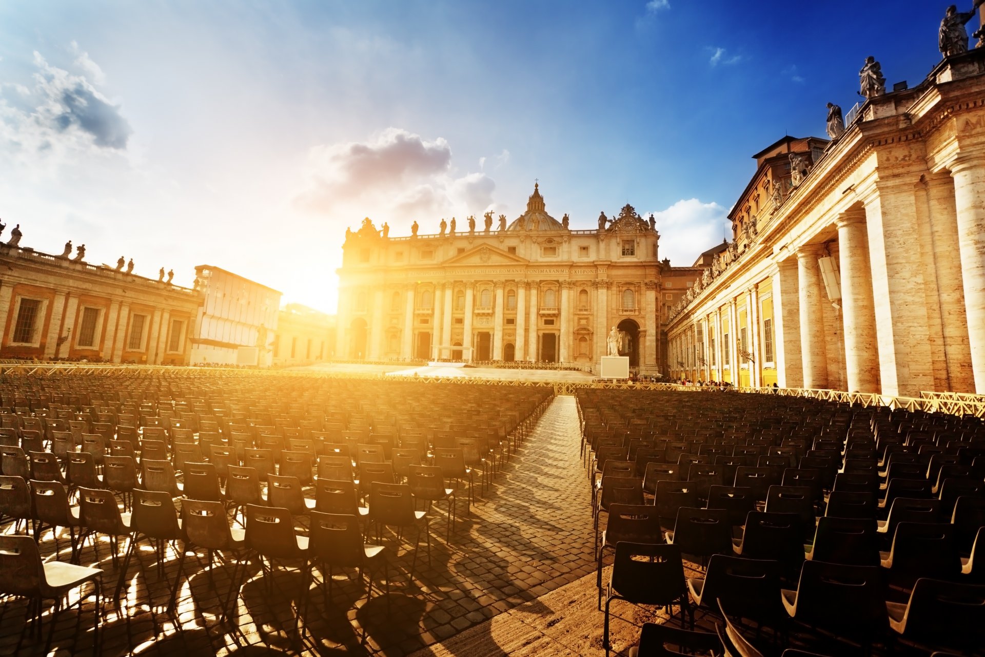 basilica di san pietro st. peter s basilica cathedral st. peter s square san pietro square vatican city rome italy city square sunset sun chairs people