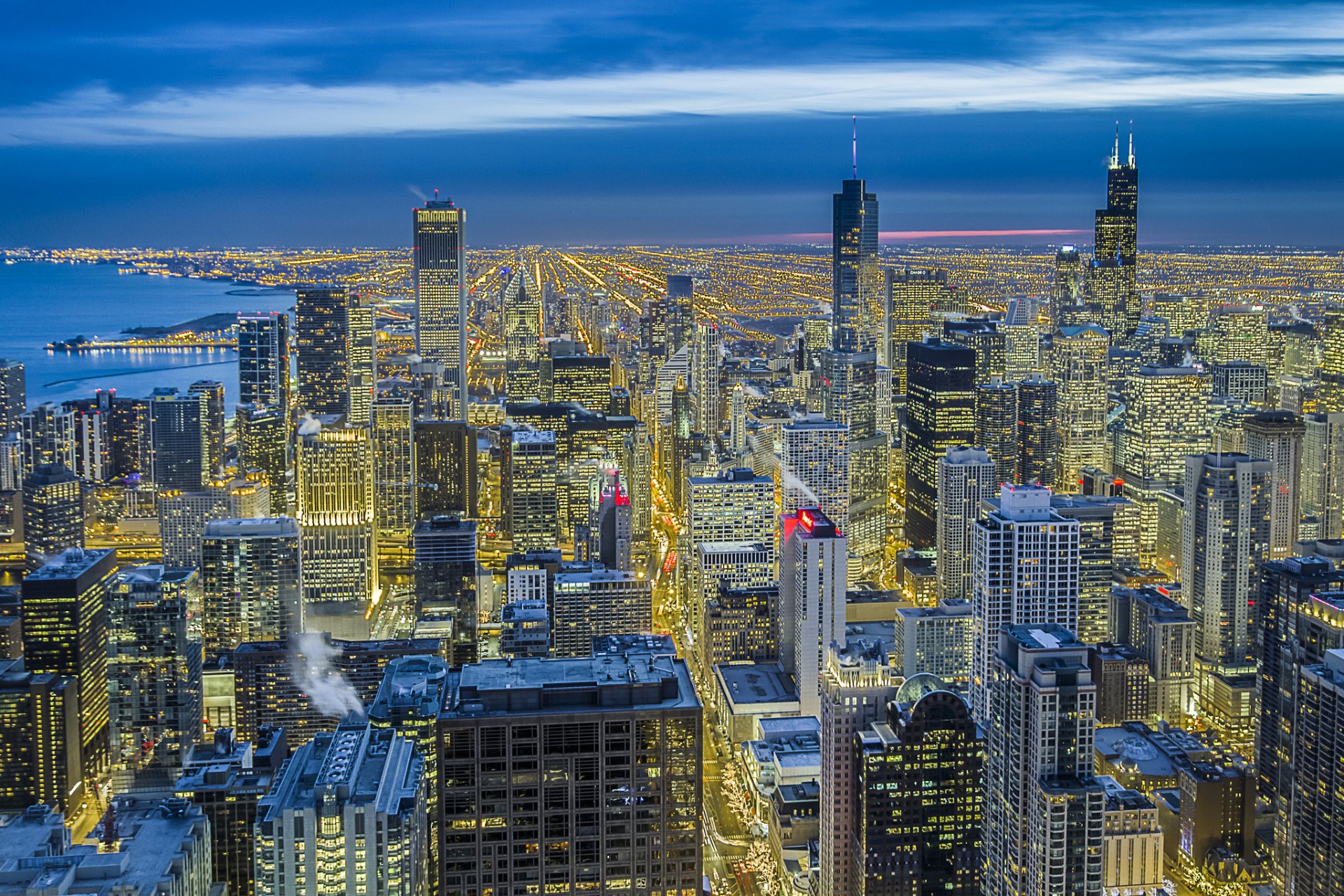 usa illinois chicago magnificent mile ville métropole bâtiments maisons gratte-ciel lumière éclairage vue hauteur panorama nuit ciel bleu