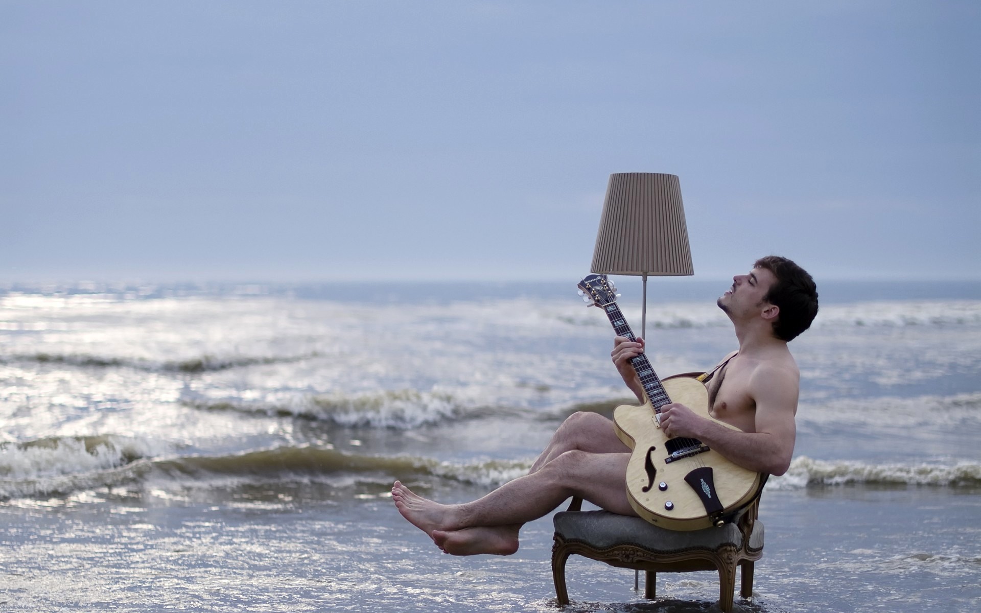 chair floor lamp waves beach music situation guitars sea mood