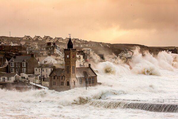 A town on the seashore during a storm