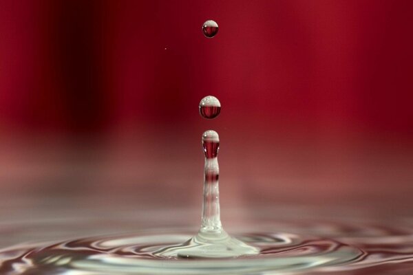 A turret made of a splash of water with a frozen droplet