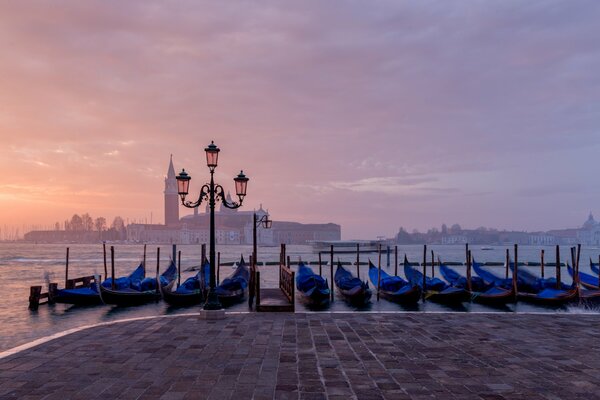 Sunrise with a view of the marina and nearby boats