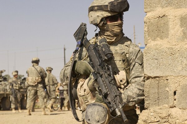 Soldiers with weapons in the war