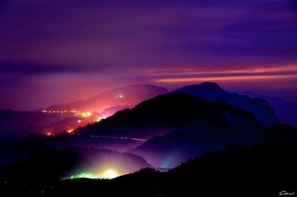 Magical night lights among the hills