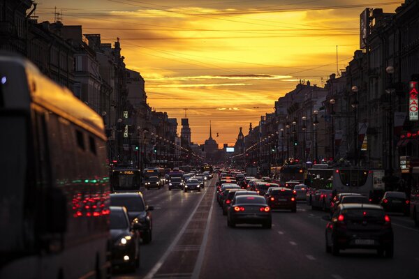 Street at sunset road cars