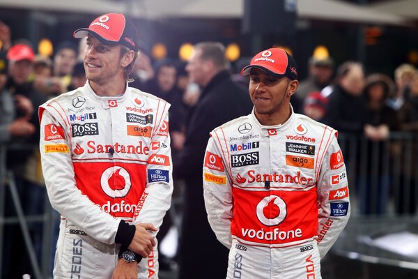 Lewis Hamilton and Jenson Button at the match