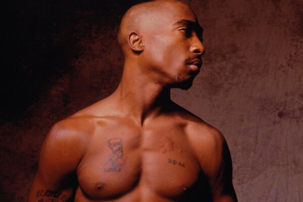 Photo of Tupac on a brown background