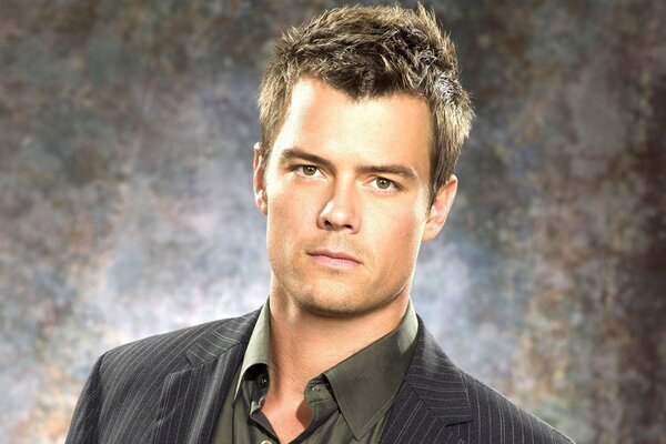 Photo of Josh Duhamel on a gray background